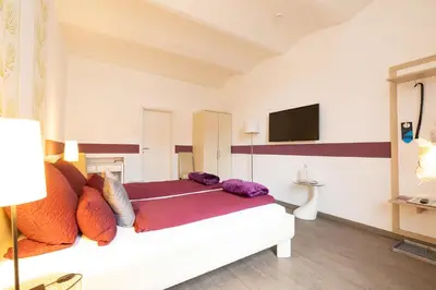 Ein Bett oder Betten in einem Zimmer der Unterkunft Hotel DAH-Inn