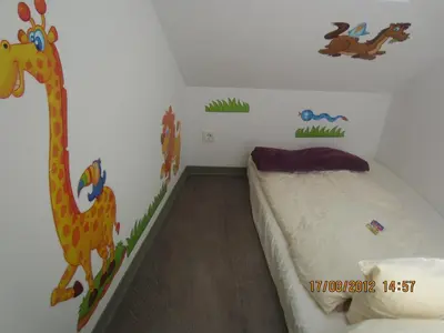 Ein Bett oder Betten in einem Zimmer der Unterkunft Hotel DAH-Inn