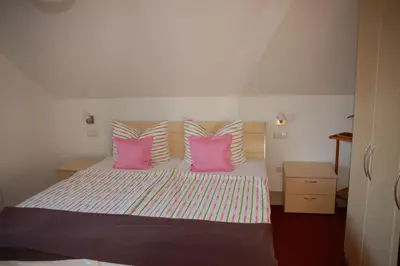 Ein Bett oder Betten in einem Zimmer der Unterkunft Erholungsfuechse Andechs