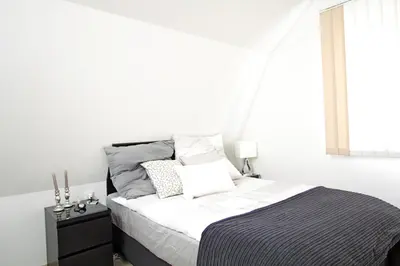 Ein Bett oder Betten in einem Zimmer der Unterkunft Boardinghouse Gaimersheim