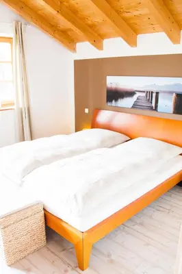 Ein Bett oder Betten in einem Zimmer der Unterkunft Hinterlechnerhof
