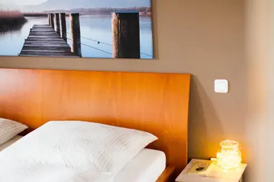 Ein Bett oder Betten in einem Zimmer der Unterkunft Hinterlechnerhof