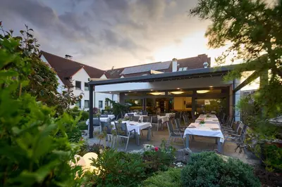 Ein Restaurant oder anderes Speiselokal in der Unterkunft Hotel Staffler