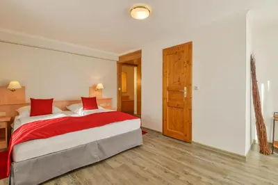 Ein Bett oder Betten in einem Zimmer der Unterkunft Landhotel zum Metzgerwirt