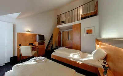 Ein Bett oder Betten in einem Zimmer der Unterkunft Hotel Gasthof Groß