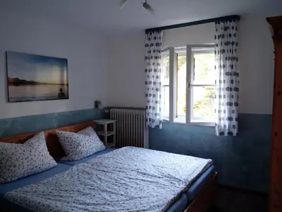 Ein Bett oder Betten in einem Zimmer der Unterkunft Das Hauslhaus