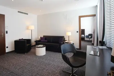 Ein Sitzbereich in der Unterkunft Schiller 5 Hotel