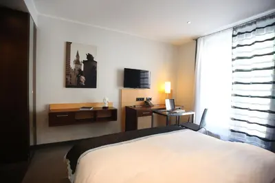 TV/Unterhaltungsangebot in der Unterkunft Schiller 5 Hotel