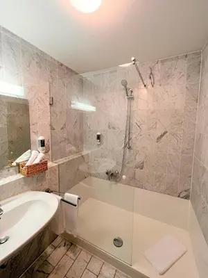 Ein Badezimmer in der Unterkunft Appartment-Hotel-Hölzl