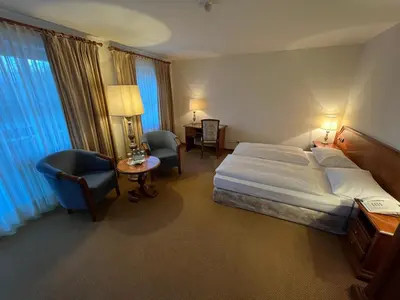 Ein Bett oder Betten in einem Zimmer der Unterkunft Appartment-Hotel-Hölzl