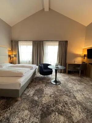 Ein Bett oder Betten in einem Zimmer der Unterkunft Appartment-Hotel-Hölzl