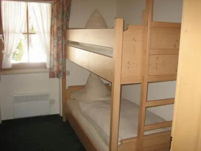 Ein Bett oder Betten in einem Zimmer der Unterkunft Sonnenkaiser