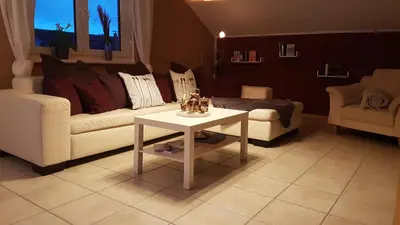 Ein Sitzbereich in der Unterkunft Ferienwohnung Blumäcker Oberbayern