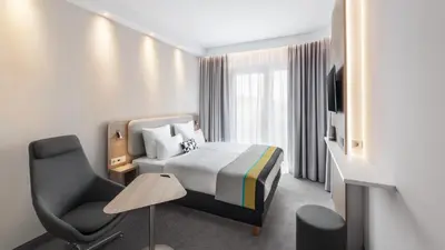Ein Bett oder Betten in einem Zimmer der Unterkunft Holiday Inn Express Munich - City East by IHG