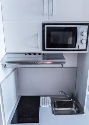 Küche/Küchenzeile in der Unterkunft FirstSleep Boardinghouse Griesfeldstrasse München