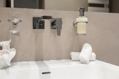 Ein Badezimmer in der Unterkunft Hotel an der Oper