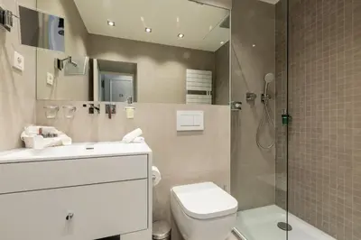 Ein Badezimmer in der Unterkunft Hotel an der Oper