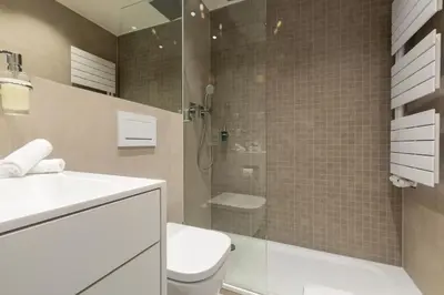 Ein Badezimmer in der Unterkunft Hotel an der Oper
