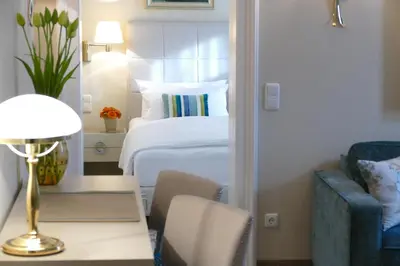 Ein Bett oder Betten in einem Zimmer der Unterkunft Hotel an der Oper