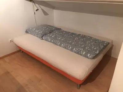Ein Bett oder Betten in einem Zimmer der Unterkunft Gästehaus Grabbe