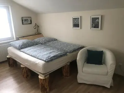 Ein Bett oder Betten in einem Zimmer der Unterkunft Gästehaus Grabbe