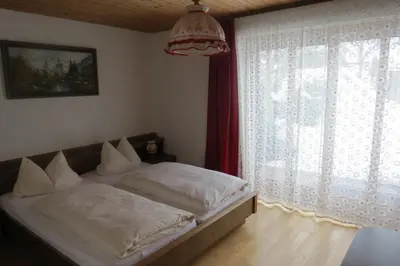 Ein Bett oder Betten in einem Zimmer der Unterkunft Gästehaus Peter Wiedemann