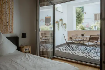 Ein Bett oder Betten in einem Zimmer der Unterkunft Old Town Apartments
