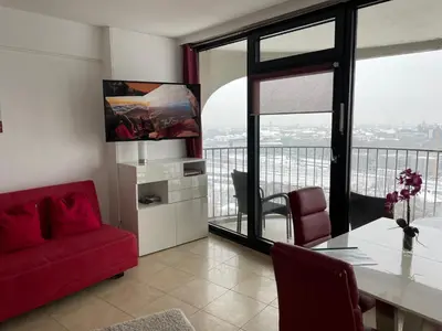 Ein Sitzbereich in der Unterkunft Hotelturm