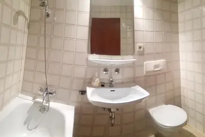 Ein Badezimmer in der Unterkunft Hotelturm