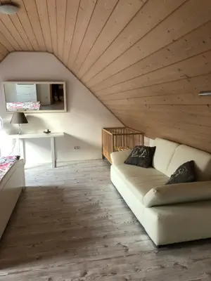 Ein Sitzbereich in der Unterkunft Ferienwohnung Held