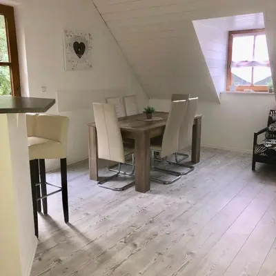 Ein Sitzbereich in der Unterkunft Ferienwohnung Held
