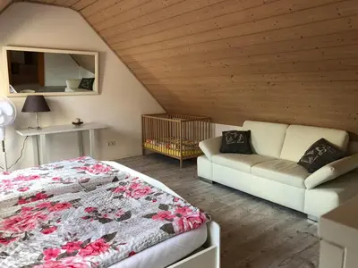 Ein Sitzbereich in der Unterkunft Ferienwohnung Held