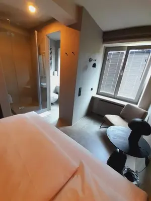 Ein Badezimmer in der Unterkunft Hotel Mons am Goetheplatz