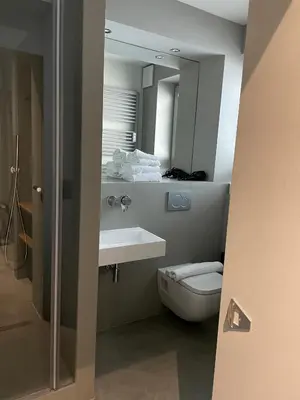 Ein Badezimmer in der Unterkunft Hotel Mons am Goetheplatz