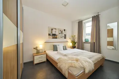 Ein Bett oder Betten in einem Zimmer der Unterkunft Hotel am Hof