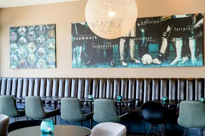 Ein Sitzbereich in der Unterkunft Motel One München-Garching