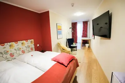 TV/Unterhaltungsangebot in der Unterkunft das kleine Hotel in München
