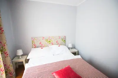 Ein Bett oder Betten in einem Zimmer der Unterkunft das kleine Hotel in München