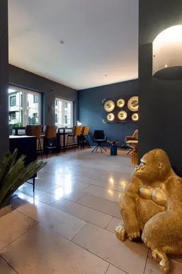 Ein Sitzbereich in der Unterkunft Hotel Biederstein am Englischen Garten