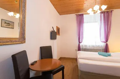 Ein Bett oder Betten in einem Zimmer der Unterkunft Hotel Moosbichl