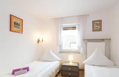 Ein Bett oder Betten in einem Zimmer der Unterkunft Hotel Moosbichl