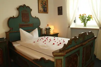 Ein Bett oder Betten in einem Zimmer der Unterkunft Hotel Moosbichl