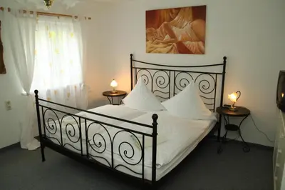 Ein Bett oder Betten in einem Zimmer der Unterkunft Hotel Moosbichl