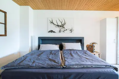 Ein Bett oder Betten in einem Zimmer der Unterkunft Ferienwohnung 