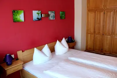 Ein Bett oder Betten in einem Zimmer der Unterkunft Hotel Atlas Sport