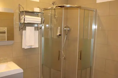 Ein Badezimmer in der Unterkunft Hotel Atlas Sport