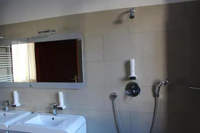 Ein Badezimmer in der Unterkunft Hotel Atlas Sport