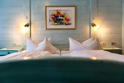 Ein Bett oder Betten in einem Zimmer der Unterkunft Landgasthof Sonnenhof