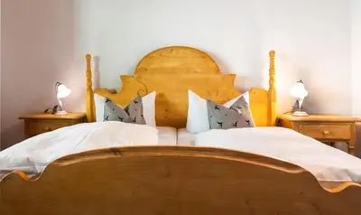 Ein Bett oder Betten in einem Zimmer der Unterkunft Landgasthof Sonnenhof