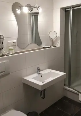 Ein Badezimmer in der Unterkunft Gasthof Fröhlich